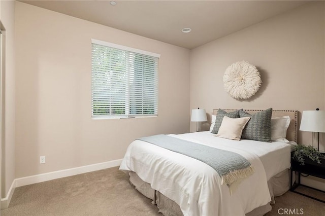 carpeted bedroom with baseboards and recessed lighting