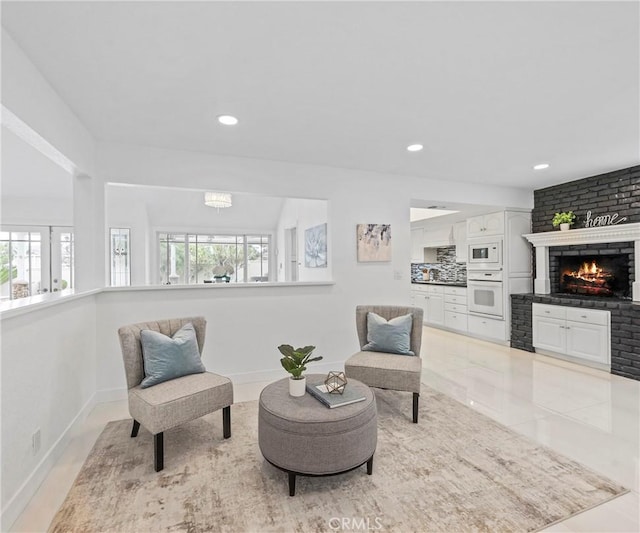 20720 Cottonwood Rd, Yorba Linda, CA 92887 - living area featuring recessed lighting, a brick fireplace, and a chandelier