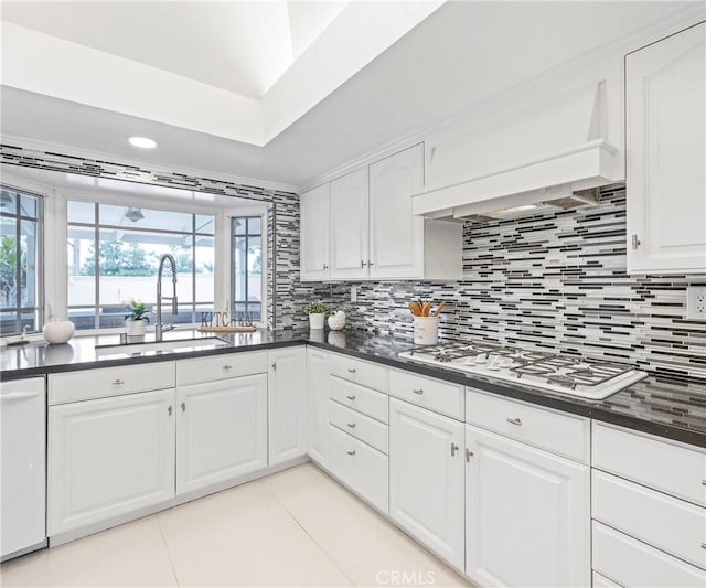20720 Cottonwood Rd, Yorba Linda, CA 92887 - kitchen with dark countertops, decorative backsplash, white appliances, and recessed lighting