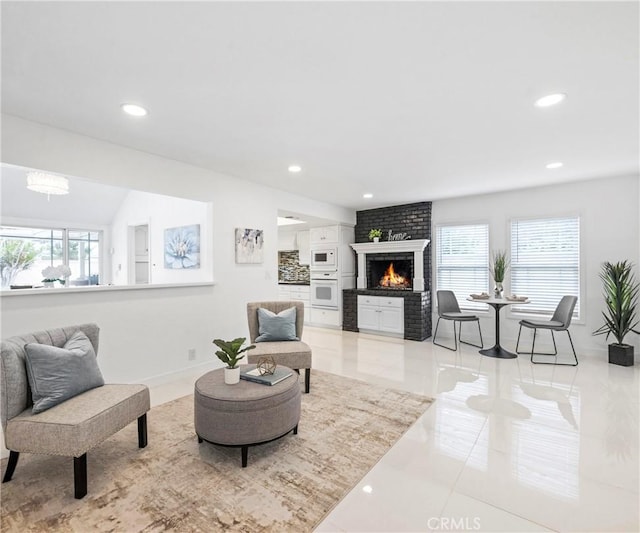 20720 Cottonwood Rd, Yorba Linda, CA 92887 - living room with a brick fireplace, recessed lighting, and light tile patterned floors
