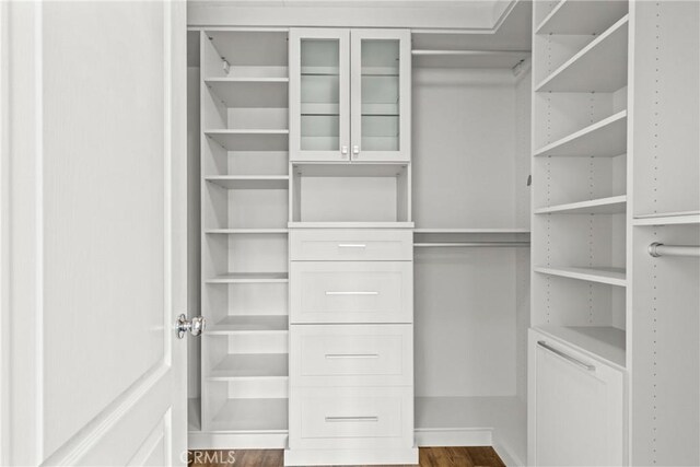2535 Canterbury Ln, Simi Valley, CA 93063 - spacious closet with dark wood-style floors