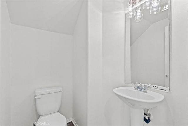 2535 Canterbury Ln, Simi Valley, CA 93063 - bathroom featuring toilet and lofted ceiling