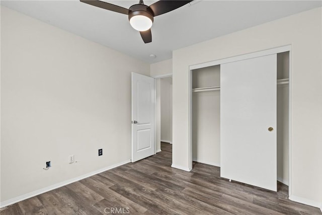 2535 Canterbury Ln, Simi Valley, CA 93063 - unfurnished bedroom featuring dark wood-style flooring, a closet, and baseboards