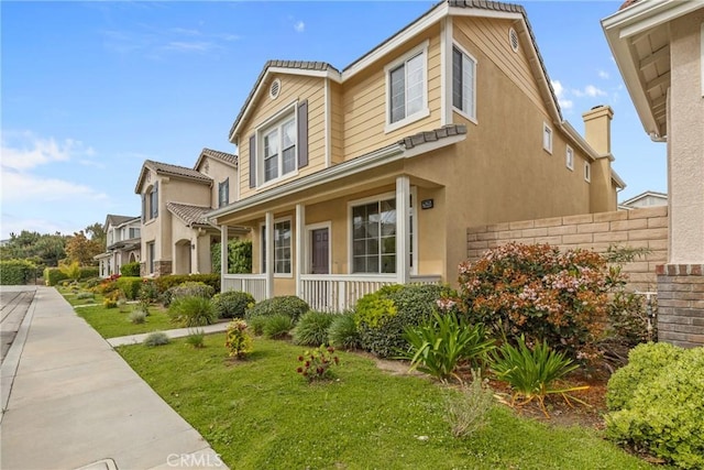 2535 Canterbury Ln, Simi Valley, CA 93063 - view of side of property with stucco siding and a porch