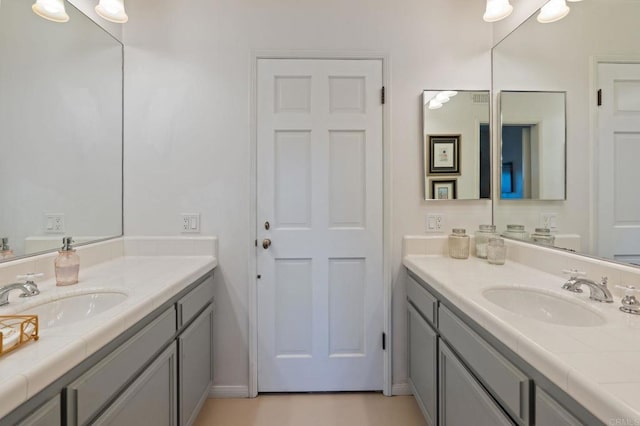 bathroom with two vanities