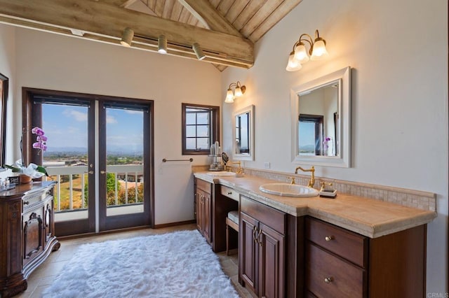bathroom with tile patterned flooring, wooden ceiling, and vanity