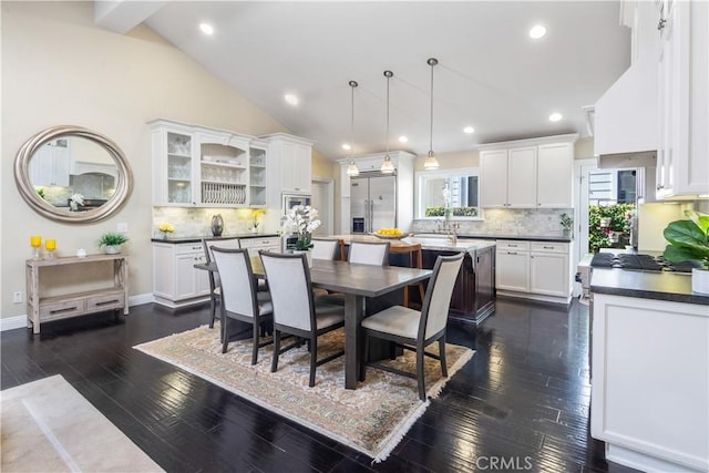 2808 Oak Ave, Manhattan Beach, CA 90266 - dining space featuring vaulted ceiling, dark wood-type flooring, recessed lighting, and baseboards