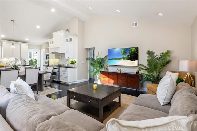 2808 Oak Ave, Manhattan Beach, CA 90266 - living room with high vaulted ceiling, beam ceiling, recessed lighting, and wood finished floors