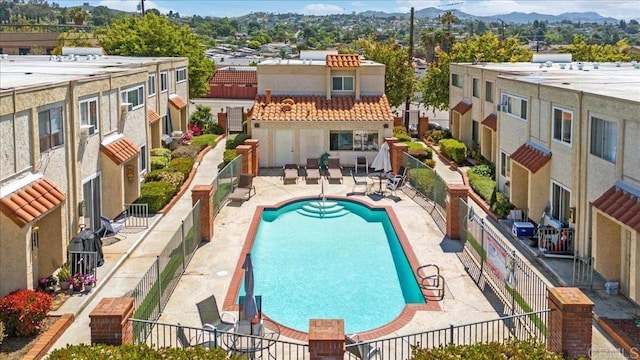 8102 Winter Gardens Blvd Unit 5, Lakeside, CA 92040 - community pool with a fenced backyard, a patio area, and a mountain view