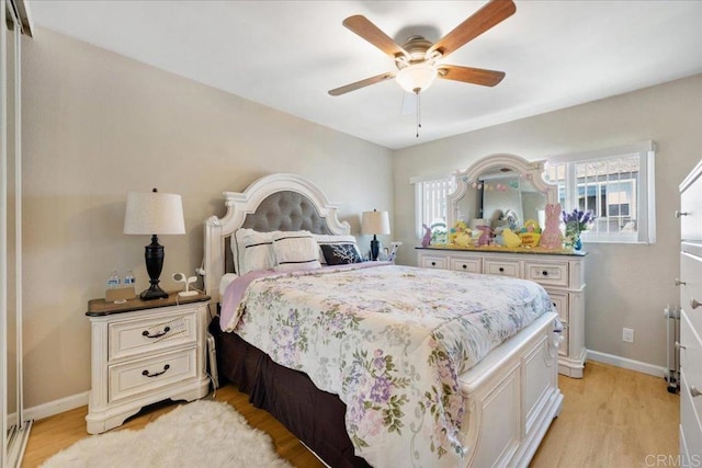 8102 Winter Gardens Blvd Unit 5, Lakeside, CA 92040 - bedroom featuring light wood-style floors and a ceiling fan