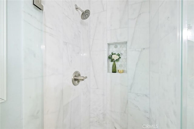 bathroom view of tiled shower
