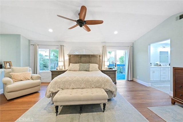 bedroom featuring access to outside, multiple windows, wood finished floors, baseboards, and recessed lighting