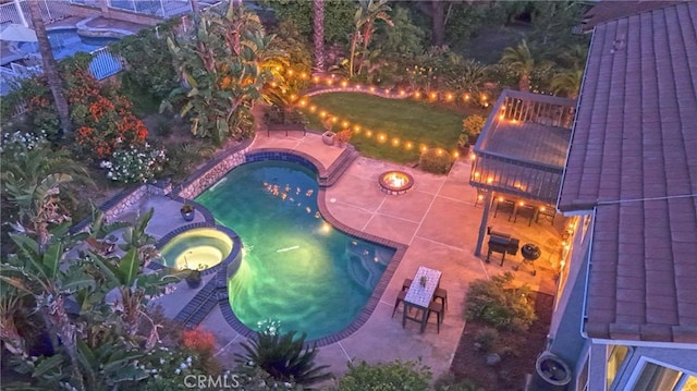 drone / aerial view of a pool area