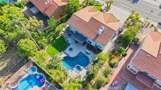 view of subject property featuring a pool area