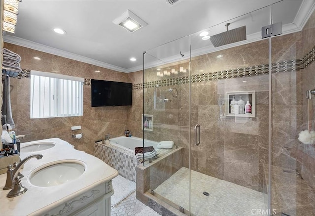 bathroom with a bath, ornamental molding, tile patterned floors, a stall shower, and double vanity