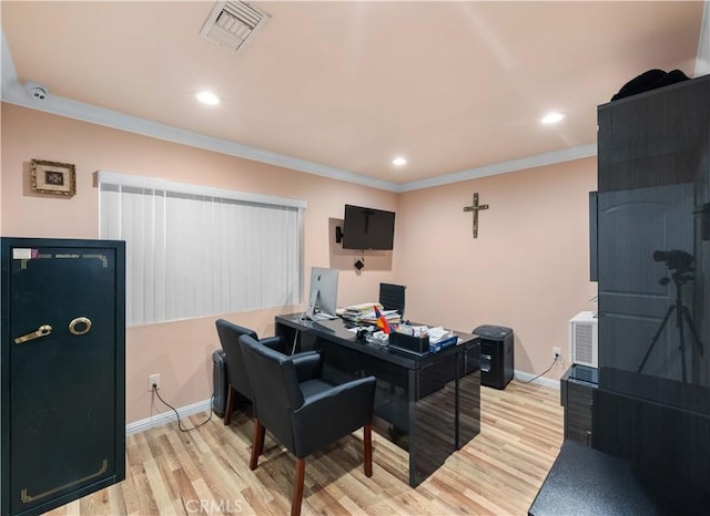 office space with baseboards, light wood-style flooring, crown molding, and recessed lighting