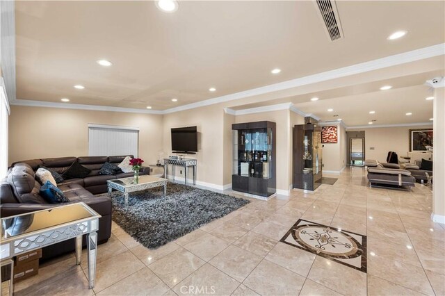 living area featuring baseboards, recessed lighting, crown molding, and light tile patterned floors