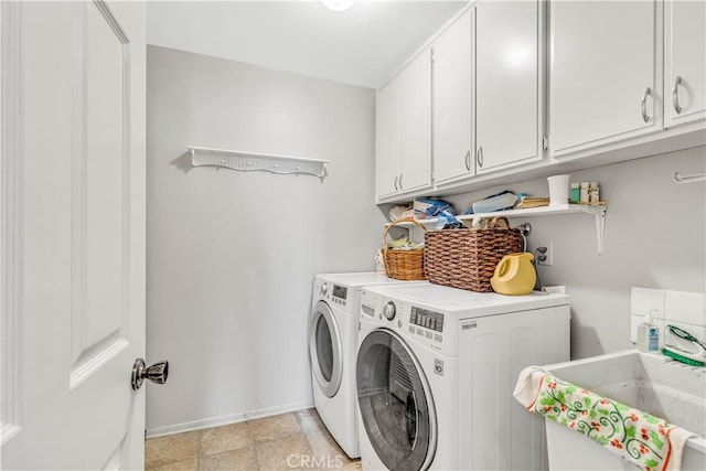 25572 Saltwater Dr, Dana Point, CA 92629 - laundry area featuring cabinet space, washing machine and clothes dryer, and baseboards