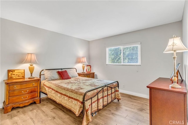 25572 Saltwater Dr, Dana Point, CA 92629 - bedroom featuring baseboards and light wood-style flooring