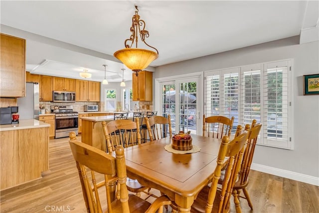 25572 Saltwater Dr, Dana Point, CA 92629 - dining room with light wood finished floors and baseboards