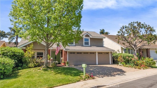 25572 Saltwater Dr, Dana Point, CA 92629 - obstructed view of property featuring a front yard, driveway, and a garage