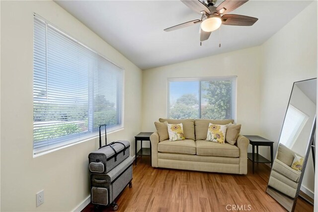 39671 Cherry Valley Blvd, Cherry Valley, CA 92223 - living room with healthy amount of natural light, wood finished floors, lofted ceiling, ceiling fan, and baseboards