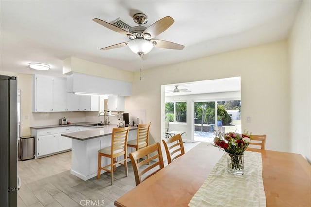 39671 Cherry Valley Blvd, Cherry Valley, CA 92223 - dining room featuring a ceiling fan and light wood-style floors