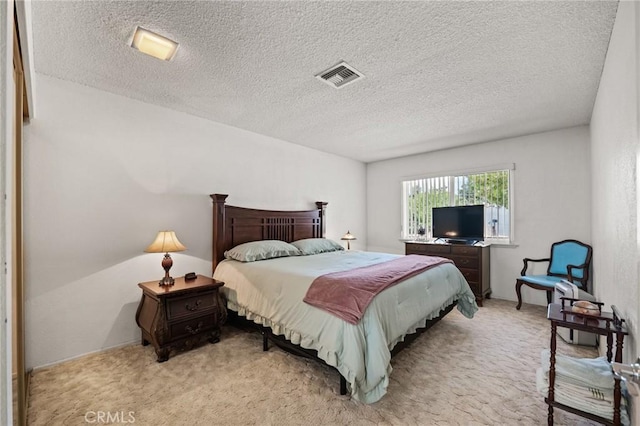 54955 Benecia Trl, Yucca Valley, CA 92284 - bedroom featuring light carpet and a textured ceiling