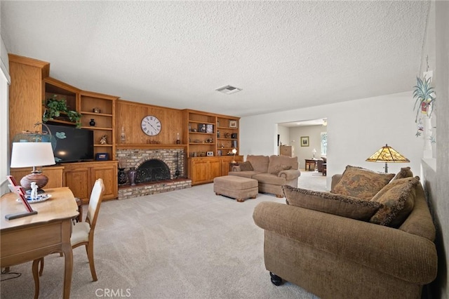 54955 Benecia Trl, Yucca Valley, CA 92284 - living area featuring a textured ceiling, light carpet, and a fireplace