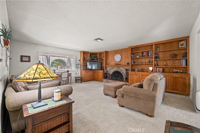 54955 Benecia Trl, Yucca Valley, CA 92284 - living area featuring light colored carpet, a textured ceiling, and a brick fireplace