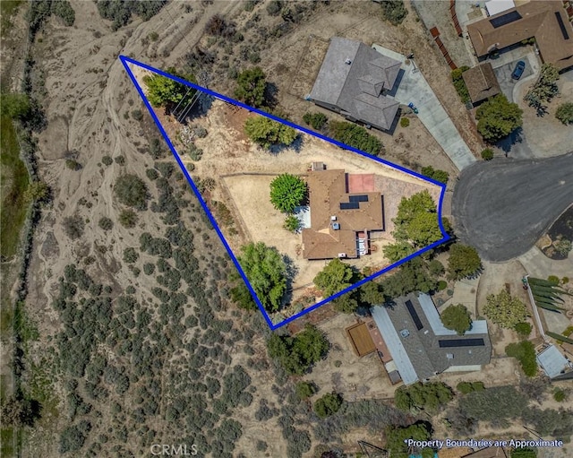 54955 Benecia Trl, Yucca Valley, CA 92284 - aerial overview of property's location with property parcel outlined and a desert landscape