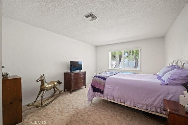 54955 Benecia Trl, Yucca Valley, CA 92284 - bedroom with carpet and a textured ceiling