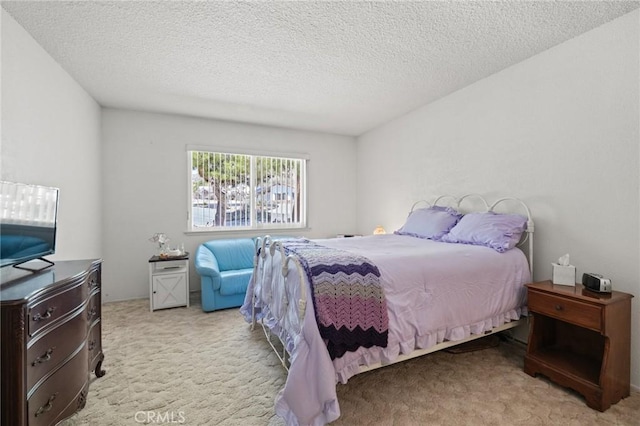 54955 Benecia Trl, Yucca Valley, CA 92284 - carpeted bedroom featuring a textured ceiling
