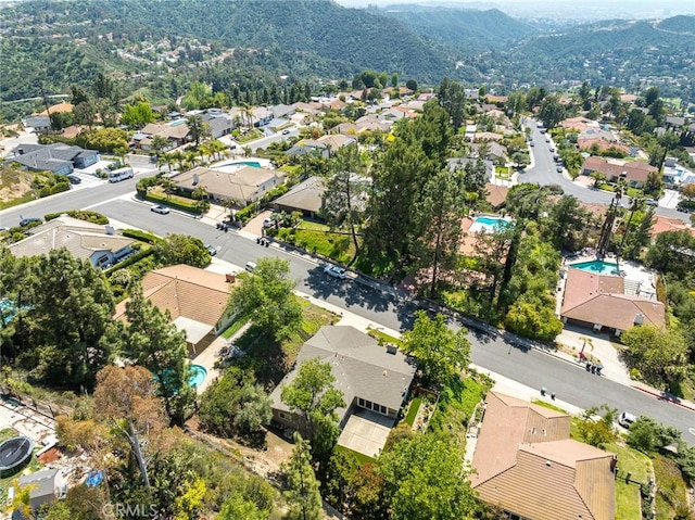aerial perspective of suburban area with a mountain backdrop