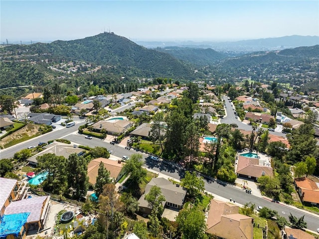 aerial perspective of suburban area featuring mountains