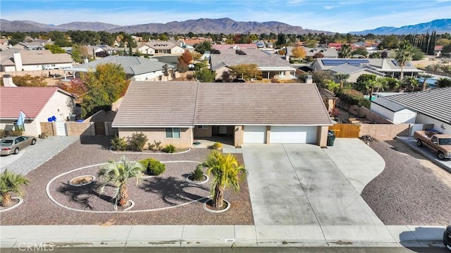 13935 Rincon Rd, Apple Valley, CA 92307 - aerial view of residential area with a mountain backdrop