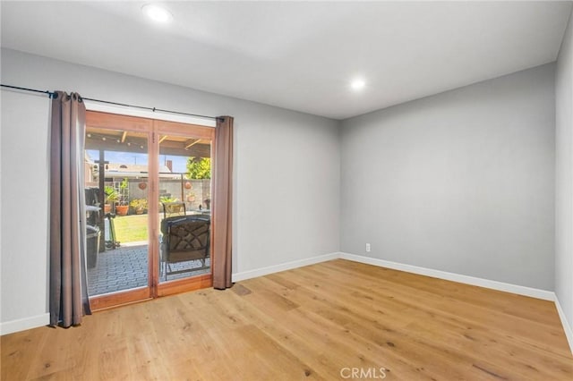 12653 Vandemere St, Lakewood, CA 90715 - unfurnished room with baseboards, light wood-type flooring, and recessed lighting