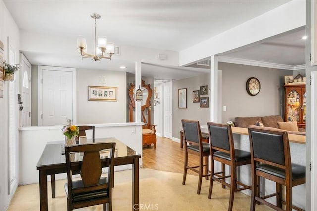 12653 Vandemere St, Lakewood, CA 90715 - dining space featuring a chandelier and light wood-style flooring