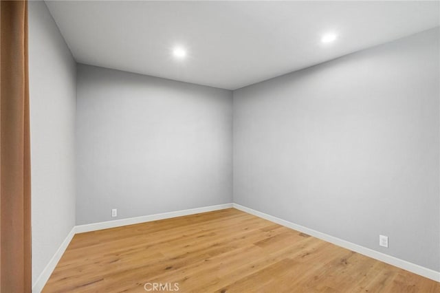 12653 Vandemere St, Lakewood, CA 90715 - unfurnished room featuring recessed lighting, baseboards, and light wood-style floors