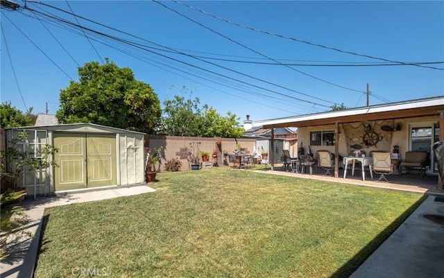 12653 Vandemere St, Lakewood, CA 90715 - view of yard featuring a shed, an outdoor structure, and a patio area