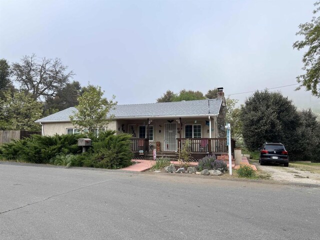 2466 Lupine Dr, Campo, CA 91906 - single story home featuring a porch, a chimney, and driveway