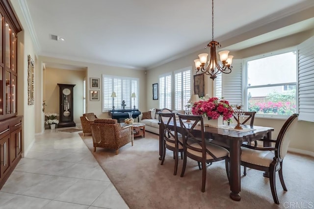 dining space featuring crown molding, light tile patterned floors, a chandelier, baseboards, and light colored carpet