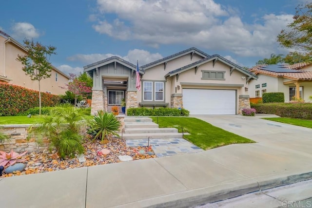 craftsman inspired home featuring stone siding, driveway, a garage, and stucco siding