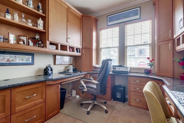 office featuring built in desk and crown molding