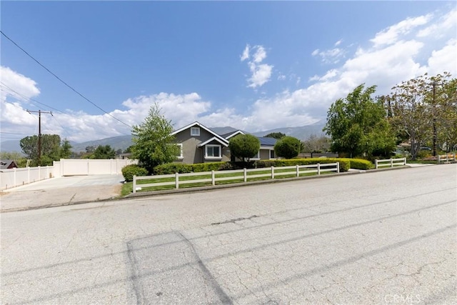 35602 Carter St, Yucaipa, CA 92399 - view of front facade with fence and a mountain view