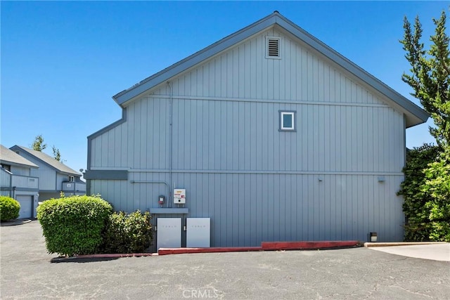 view of side of home featuring board and batten siding