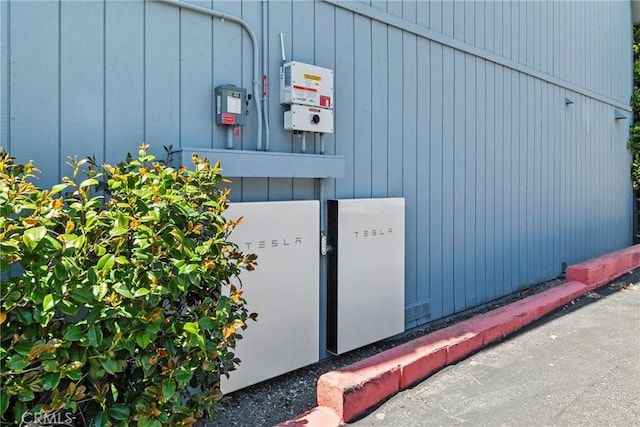 exterior view of wall-mounted power storage and related energy utilities