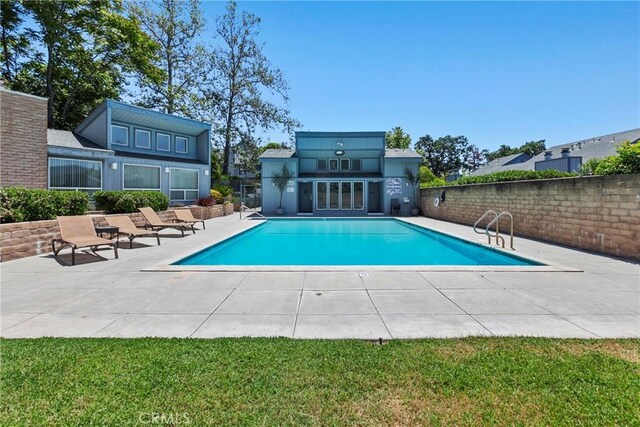 community pool featuring a patio