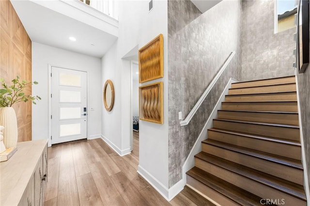27 Alessio, Lake Forest, CA 92630 - entrance foyer with stairs, light wood finished floors, healthy amount of natural light, and recessed lighting