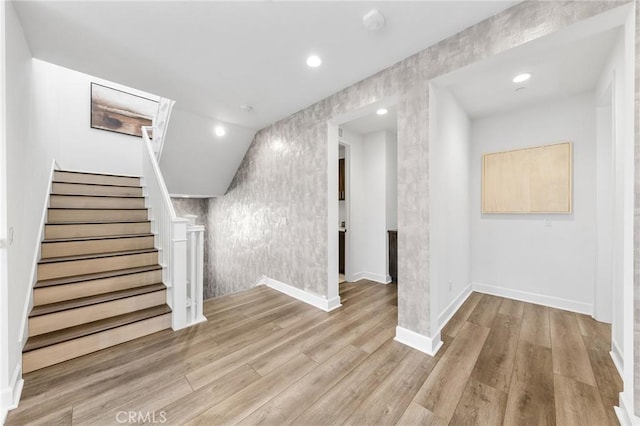 27 Alessio, Lake Forest, CA 92630 - basement with wood finished floors, recessed lighting, and stairway